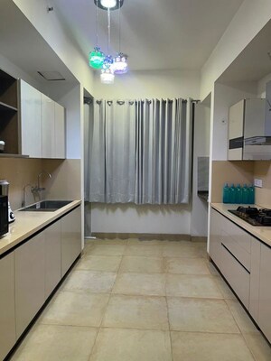 Kitchen in 4 BHK Apartment at Emaar Orange Castle, Gomti Nagar – for Rent