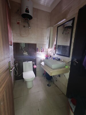 Bathroom in 3 BHK Builder Floor at Ansal API Vyapar Kendra, Sector 43 – for Rent