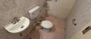 Bathroom in 3 BHK Apartment at Naiknavare Sunshine Court, Kalyani Nagar – for Rent