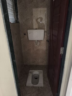 Bathroom in 1 BHK Apartment at Ashtavinayak Ramatai Heights, Gotheghar – for Rent