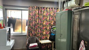 Bedroom in 2 BHK Apartment at Yogi Palace CHS, Borivali West – for Sale
