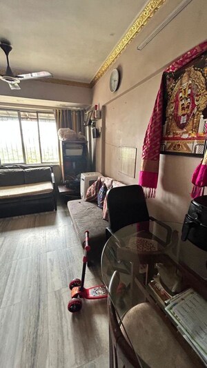 Living Room in 2 BHK Apartment at Yogi Palace CHS, Borivali West – for Sale
