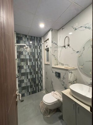 Bathroom in 3.5 BHK Builder Floor at Green Fields Colony – for Rent