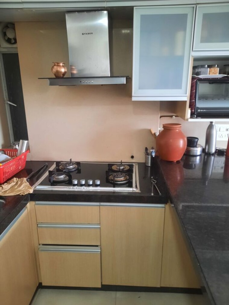 Kitchen, divine-aspen-garden 1 Bedroom 550 Sq.Ft. Apartment In Goregaon East Mumbai 10400995
