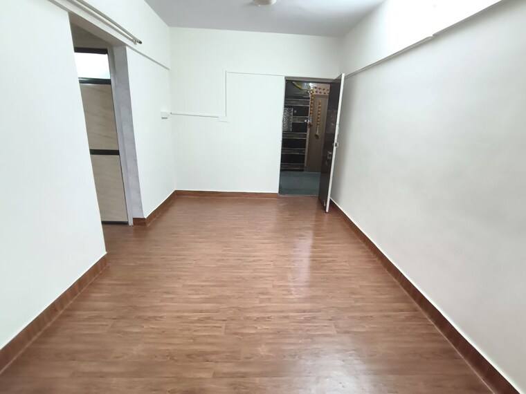 Living Room, shalmali-cooperative-housing-society 1 Bedroom 410 Sq.Ft. Apartment In Vasant Vihar Thane 10401080