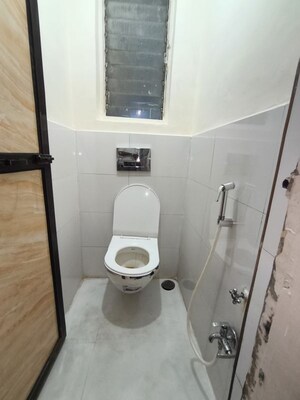 Bathroom in 1 BHK Apartment at Shalmali Cooperative Housing Society, Vasant Vihar – for Rent