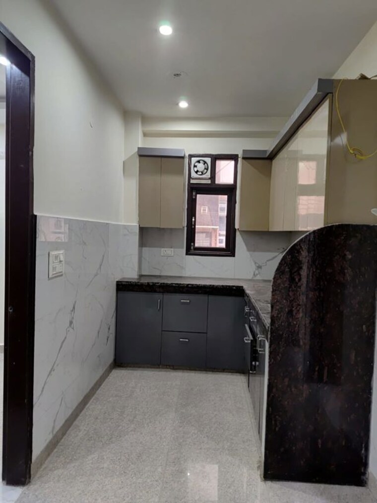 Kitchen, rama park 3 Bedroom 1350 Sq.Ft. Builder Floor In Rama Park Delhi 10401171