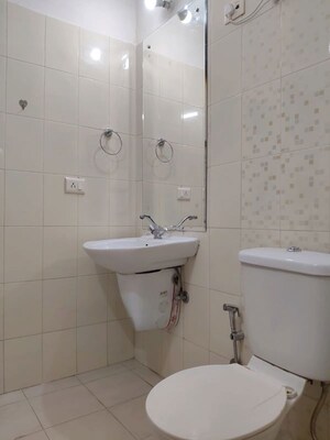 Bathroom in 3 BHK Apartment at Omaxe Designer Villas Mayfield Garden, Sector 51 – for Rent