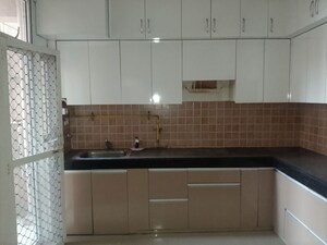 Kitchen in 2.5 BHK Apartment at Mahagun My Woods, Sector 16c Greater Noida – for Rent