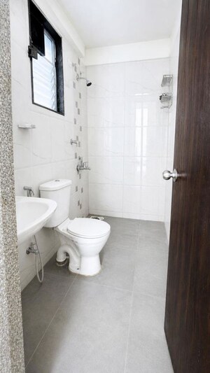 Bathroom in 2 BHK Apartment at Kumar Urban Kul Ecoloch, Mahalunge – for Rent