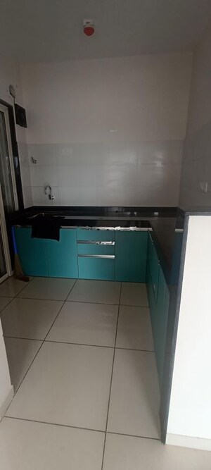 Kitchen in 2 BHK Apartment at Rama Metro Life Optima, Tathawade – for Rent
