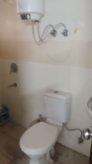 Bathroom in 2 BHK Apartment at Milan Earth, Raj Nagar Extension – for Rent