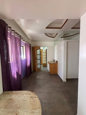 Living Room in 2 BHK Apartment at Arihant Apartments Baner, Baner – for Rent