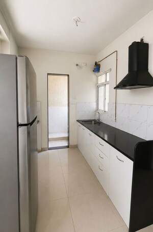 Kitchen in 2 BHK Apartment at Kolte Patil Life Republic 16th Avenue Arezo, Hinjewadi – for Rent