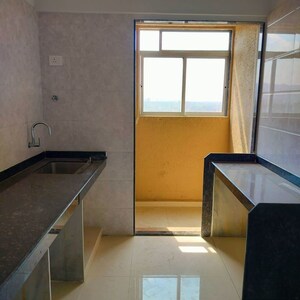 Kitchen in 1 BHK Apartment at RS QA Riverfront, Taloja – for Rent