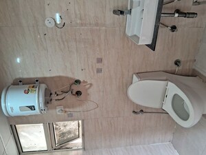 Bathroom in 2.5 BHK Apartment at M R Platinum 321, Raj Nagar Extension – for Rent