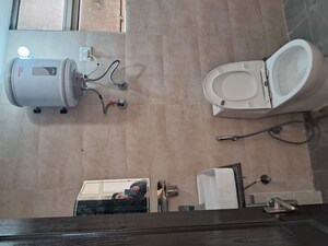 Bathroom in 2.5 BHK Apartment at M R Platinum 321, Raj Nagar Extension – for Rent