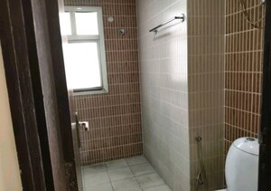 Bathroom in 3 BHK Apartment at Omaxe Palm Greens, Mu Greater Noida – for Rent