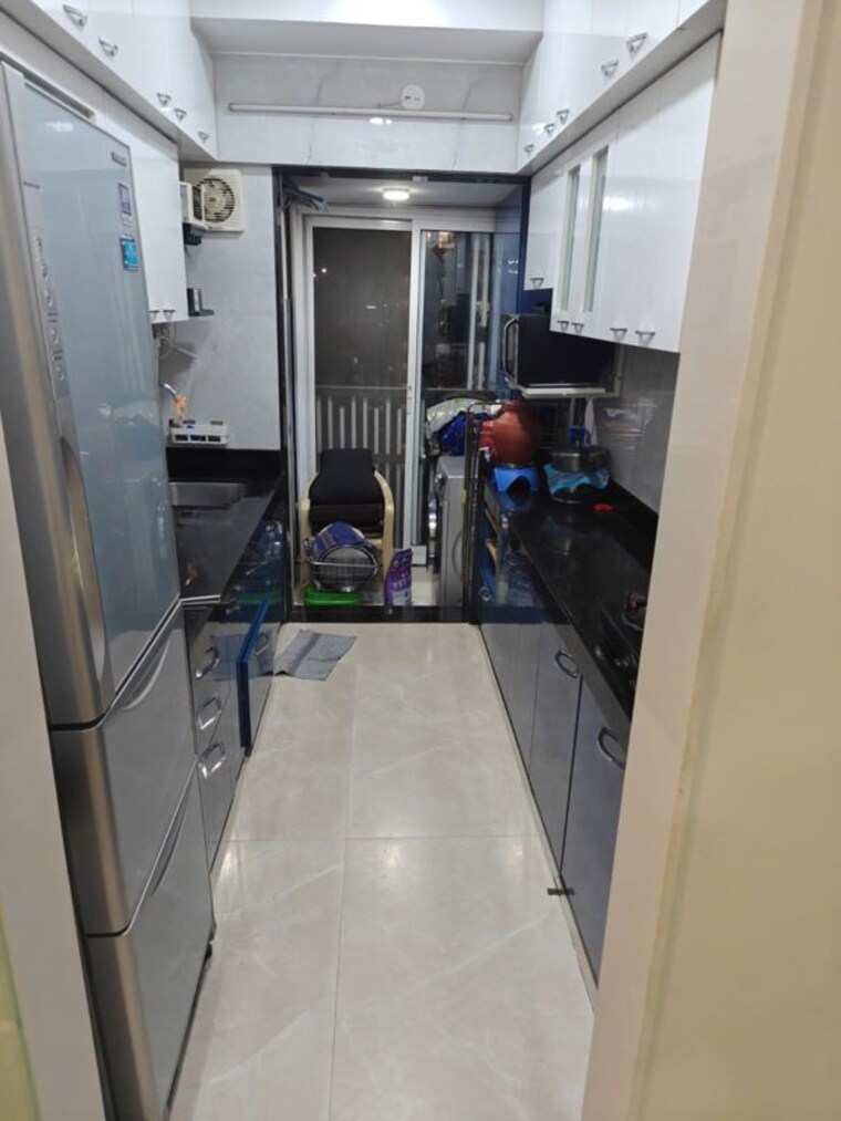 Kitchen, paradigm-ananda-residency 2 Bedroom 715 Sq.Ft. Apartment In Borivali West Mumbai 10401678