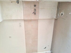 Bathroom in 2 BHK Apartment at Mittal Rajnagar Residency, Raj Nagar Extension – for Sale