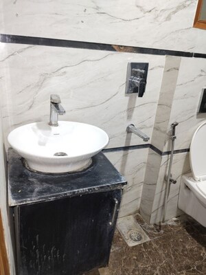 Bathroom in 3 BHK Apartment at Panchsheel Vihar – for Rent
