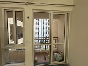 Living Room in 2 BHK Apartment at Jaypee Green Kosmos Phase II, Sector 134 – for Rent