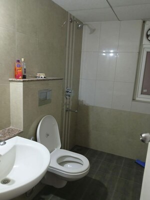 Bathroom in 3 BHK Apartment at Kolte Patil iTowers Exente, Electronic City Phase I – for Rent