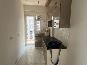 Kitchen in 2 BHK Apartment at Casa Woodstock, Sector 16c Greater Noida – for Sale