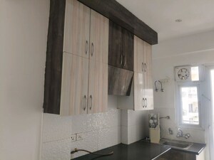 Kitchen in 3 BHK Apartment at Casa Woodstock, Sector 16c Greater Noida – for Sale