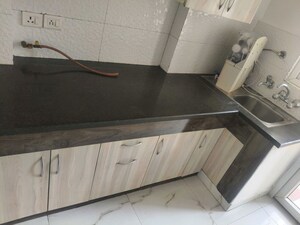 Kitchen in 3 BHK Apartment at Casa Woodstock, Sector 16c Greater Noida – for Sale