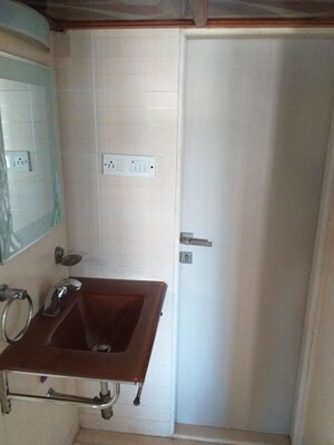 Bathroom in 3 BHK Apartment at Indradarshan II, Oshiwara – for Rent
