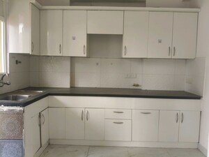 Kitchen in 3 BHK Apartment at Casa Woodstock, Sector 16c Greater Noida – for Sale