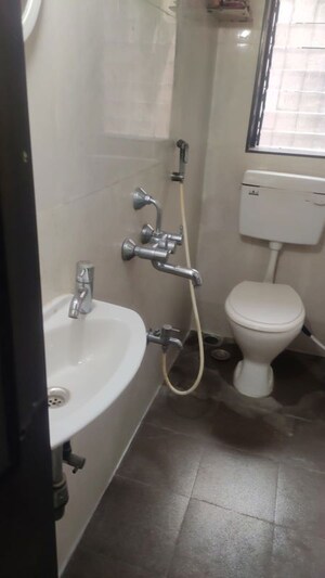 Bathroom in 1 BHK Apartment at Kishor Darshan Apartment, Andheri West – for Rent