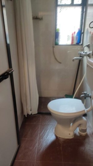 Bathroom in 1 BHK Apartment at Kishor Darshan Apartment, Andheri West – for Rent