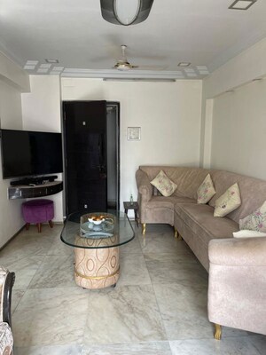 Living Room in 1 BHK Apartment at New Neelam CHS, Andheri West – for Sale