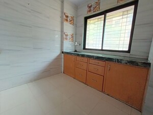 Kitchen/pantry in 1 BHK Apartment at RNA NG Regency Phase I, Balkum Pada – for Sale