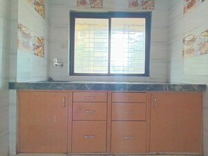 Kitchen/pantry in 1 BHK Apartment at RNA NG Regency Phase I, Balkum Pada – for Sale