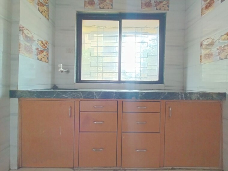 Kitchen/pantry, rna-ng-regency-phase-i 1 Bedroom 585 Sq.Ft. Apartment In Balkum Pada Thane 10402128