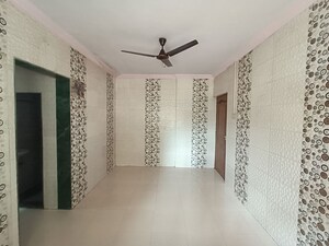 Living Room in 1 BHK Apartment at RNA NG Regency Phase I, Balkum Pada – for Sale