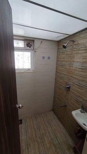 Bathroom in 1 BHK Apartment at Chandiwala Pearl Majestic, Jogeshwari West – for Rent