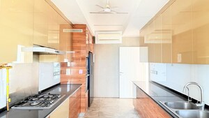 Kitchen in 4 BHK Apartment at DLF The Crest, Sector 54 – for Rent