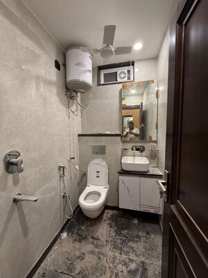 Bathroom in 2 BHK Builder Floor at Kalkaji – for Rent