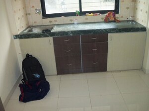 Kitchen in 2 BHK Apartment at RNA NG Regency Phase I, Balkum Pada – for Sale