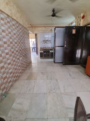 Parking in 2.5 BHK Apartment at Unique Garden CHS, Malad West – for Rent