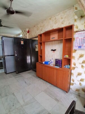 Living Room in 2.5 BHK Apartment at Unique Garden CHS, Malad West – for Rent