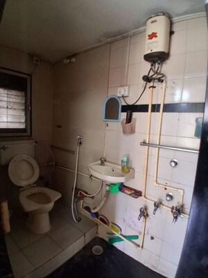 Bathroom in 2.5 BHK Apartment at Unique Garden CHS, Malad West – for Rent
