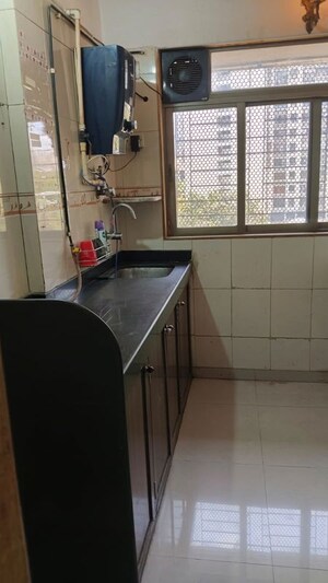 Kitchen in 1 BHK Apartment at Ashok Enclave Malad West, Malad West – for Rent