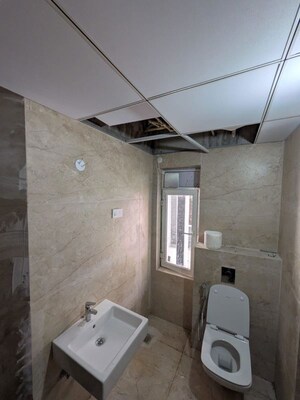 Bathroom in 3 BHK Apartment at Aparna Zenon, Puppalaguda – for Rent