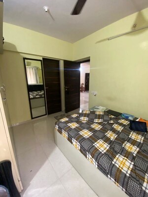 Bedroom in 2 BHK Apartment at Gurukrupa Marina Enclave, Malad West – for Rent
