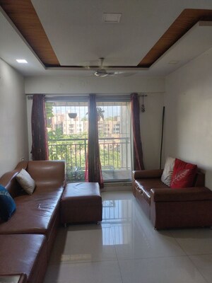 Living Room in 3 BHK Apartment at Garden Court, Waghbil – for Rent